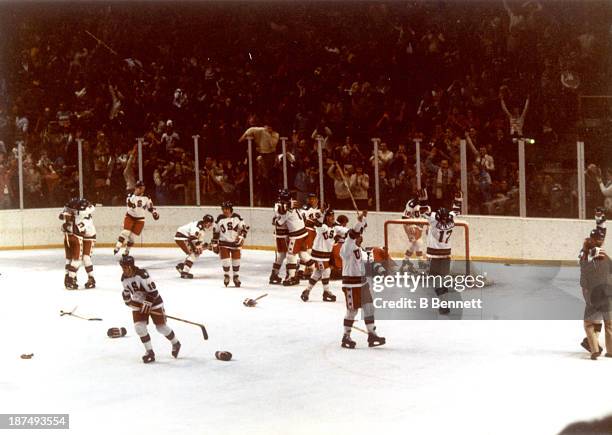 Team USA celebrates their 4-3 victory over the Soviet Union in the semi-final Men's Ice Hockey event at the Winter Olympic Games in Lake Placid, New...