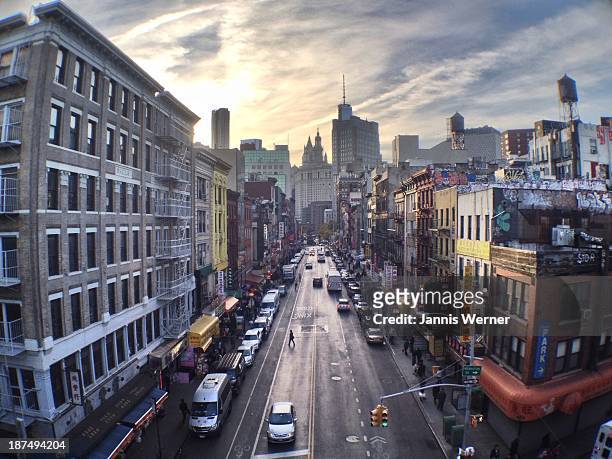 east broadway at dusk - broadway manhattan stock pictures, royalty-free photos & images