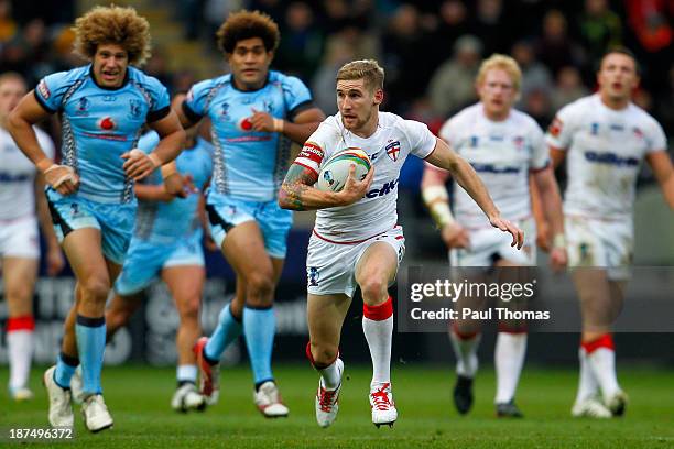 Sam Tomkins of England in action during the Rugby League World Cup Group A match at the KC Stadium on November 9, 2013 in Hull, England.