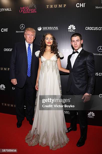 Donald Trump, Olivia Culpo and Nick Jonas attend the red carpet at Miss Universe Pageant Competition 2013 on November 9, 2013 in Moscow, Russia.