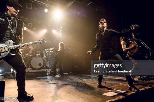 Keith Nelson, Josh Todd, Kelly LeMieux and Stevie Dacanay of Buckcherry perform live during a concert at C-Club on November 9, 2013 in Berlin,...