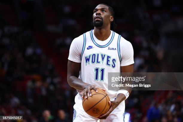 Naz Reid of the Minnesota Timberwolves shoots a free throw against the Miami Heat during the first quarter at Kaseya Center on December 18, 2023 in...
