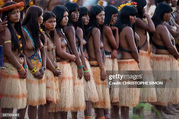 Natives wait for the start of the opening ceremony of the International Games of Indigenous Peoples, in Cuiaba, state of Mato Grosso, on November 9,...