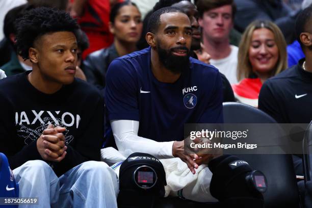 Mike Conley of the Minnesota Timberwolves wears the Hyperice Leg Sleeve during the third quarter of the game against the Miami Heat at Kaseya Center...