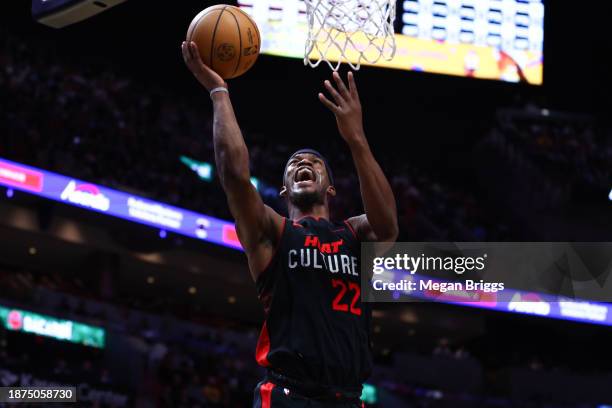 Jimmy Butler of the Miami Heat drives to the basket against the Minnesota Timberwolves during the third quarter of the game at Kaseya Center on...