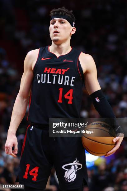 Tyler Herro of the Miami Heat prepares to shoot a free throw against the Minnesota Timberwolves during the fourth quarter of the game at Kaseya...