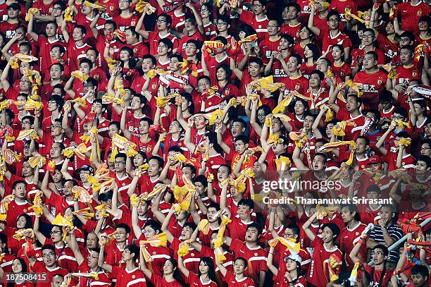 Guangzhou supporters cheer for Guangzhou Evergrande during the AFC Champions League Final 2nd leg match between Guangzhou Evergrande and FC Seoul at...