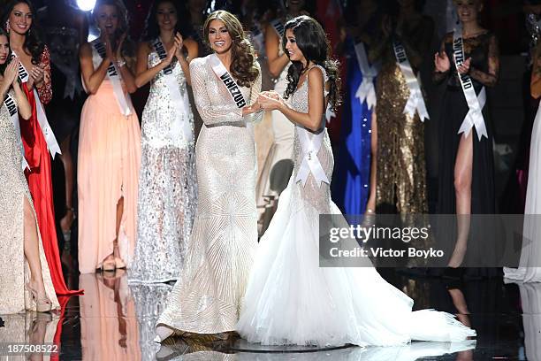 Gabriela Isler and Patricia Yurena Rodriguez await the judges' decision during the Miss Universe Pageant Competition 2013 on November 9, 2013 in...