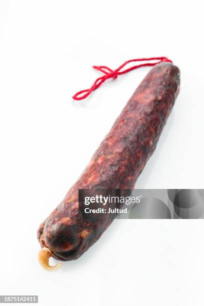 whole sausage loaf. isolated on white background - embutido stock-fotos und bilder