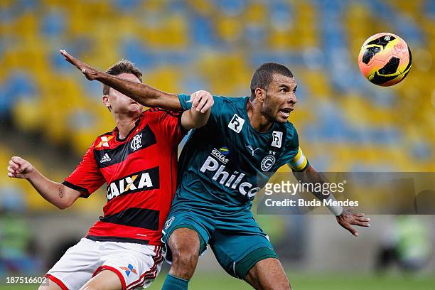 Adryan of Flamengo struggles for the ball during the Brazilian Series A 2013 between Flamengo and Goias at Maracana on November 9, 2013 in Rio de...