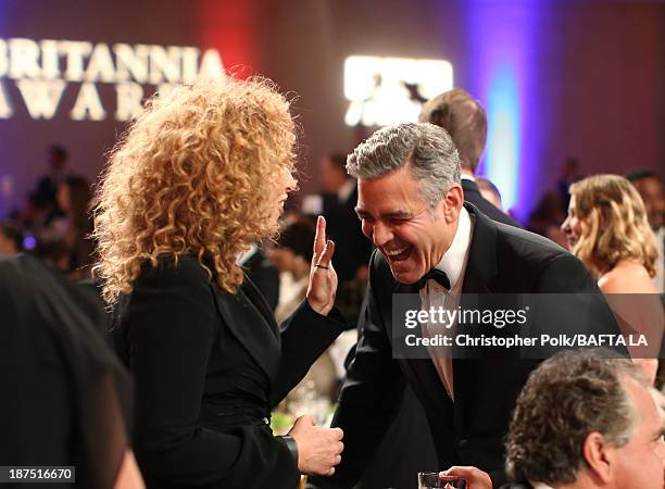 Actress Alex Kingston and filmmaker George Clooney attend the 2013 BAFTA LA Jaguar Britannia Awards presented by BBC America at The Beverly Hilton...