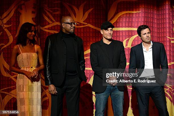 Actress Zoe Saldana, actor Forest Whitaker, actor Woody Harrelson, and actor Casey Affleck attend the screening of "Out of the Furnace" during AFI...