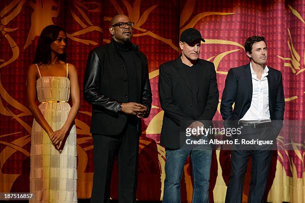 Actress Zoe Saldana, actor Forest Whitaker, actor Woody Harrelson, and actor Casey Affleck attend the screening of "Out of the Furnace" during AFI...