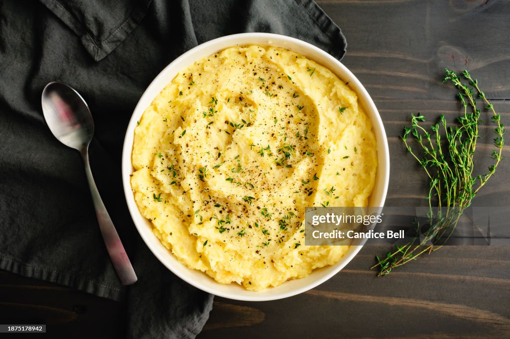 Roasted Garlic Mascarpone Mashed Potatoes with Fresh Thyme and Black Pepper