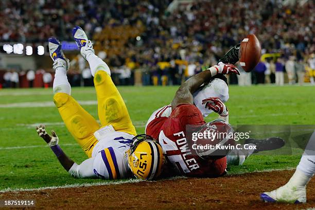 Jalston Fowler of the Alabama Crimson Tide scores a touchdown against Craig Loston of the LSU Tigers in the fourth quarter of the game at...