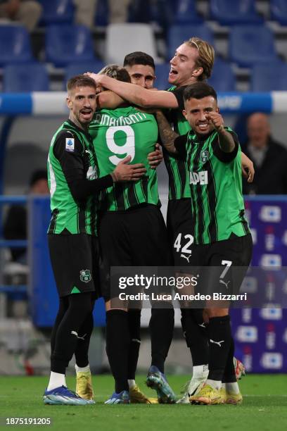 Andrea Pinamonti of US Sassuolo celebrates after scoring his team's first goal with his teammates during the Serie A TIM match between US Sassuolo...