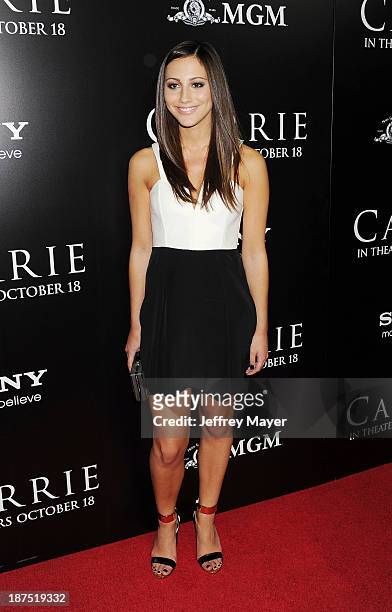 Actress Zoe Belkin arrives at the Los Angeles premiere of "Carrie" at ArcLight Hollywood on October 7, 2013 in Hollywood, California.