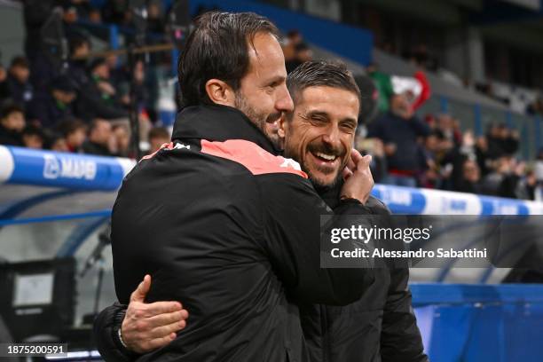Alberto Gilardino head coach of Genoa CFC embraces Alessio Dionisi head coach of US Sassuolo during the Serie A TIM match between US Sassuolo and...