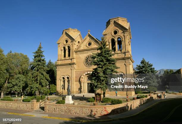 An exterior view of the Cathedral Basilica of St. Francis of Assisi, built in 1869, in historic downtown Santa Fe, New Mexico, 1978. .