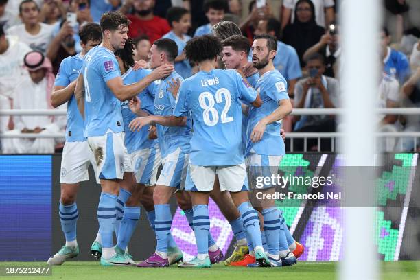 Players of Manchester City celebrate their team's second goal, an own-goal scored by Nino of Fluminense during the FIFA Club World Cup Saudi Arabia...