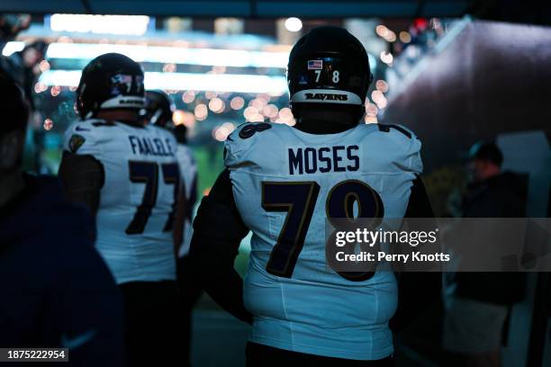 Morgan Moses of the Baltimore Ravens walks out of the tunnel prior to an NFL football game against the Jacksonville Jaguars at EverBank Stadium on...