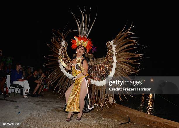 Dancer performs at the Bacchanal Magazine cover launch and awards presentation during Aruba In Style 2013 at Westin Aruba Resort on November 9, 2013...