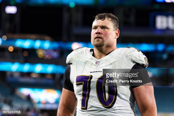 Kevin Zeitler of the Baltimore Ravens walks off of the field after an NFL football game against the Jacksonville Jaguars at EverBank Stadium on...
