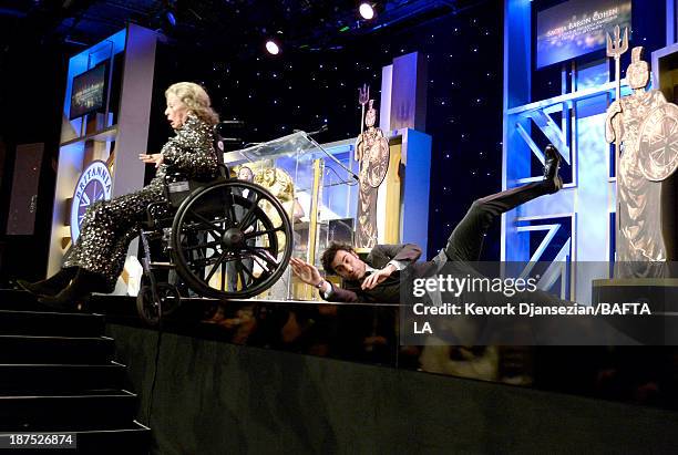 Actor Sacha Baron Cohen , recipient of the Charlie Chaplin Britannia Award for Excellence in Comedy, and stunt performer onstage during the 2013...