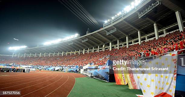 Supporters for Guangzhou Evergrande hold flags during the AFC Champions League Final 2nd leg match between Guangzhou Evergrande and FC Seoul at...