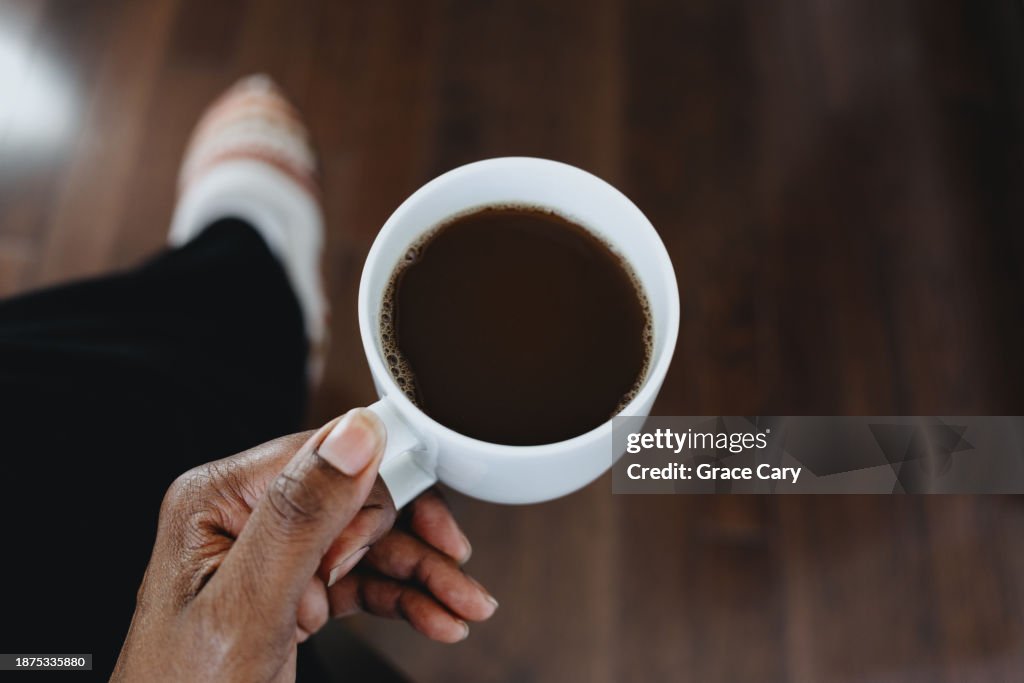 Woman Enjoys a Coffee Break