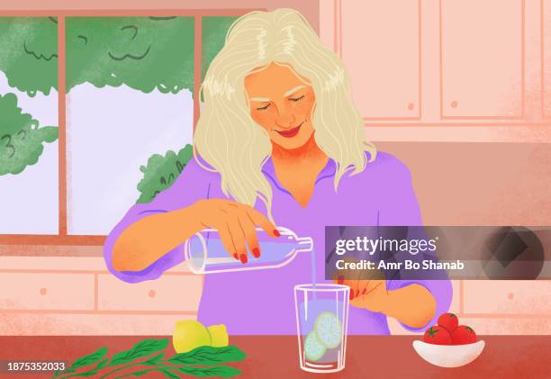 woman preparing and pouring healthy lemon water in kitchen - körperbewusstsein stock-grafiken, -clipart, -cartoons und -symbole