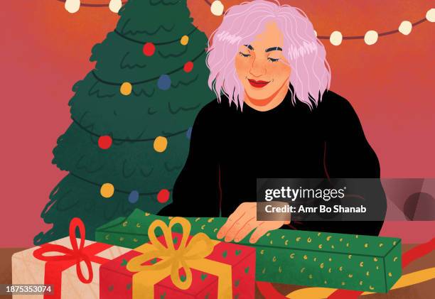 woman wrapping christmas gifts by christmas tree with string lights - wrapped stock illustrations