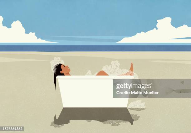 carefree woman enjoying bubble bath in bathtub on sunny ocean beach - holiday stock illustrations