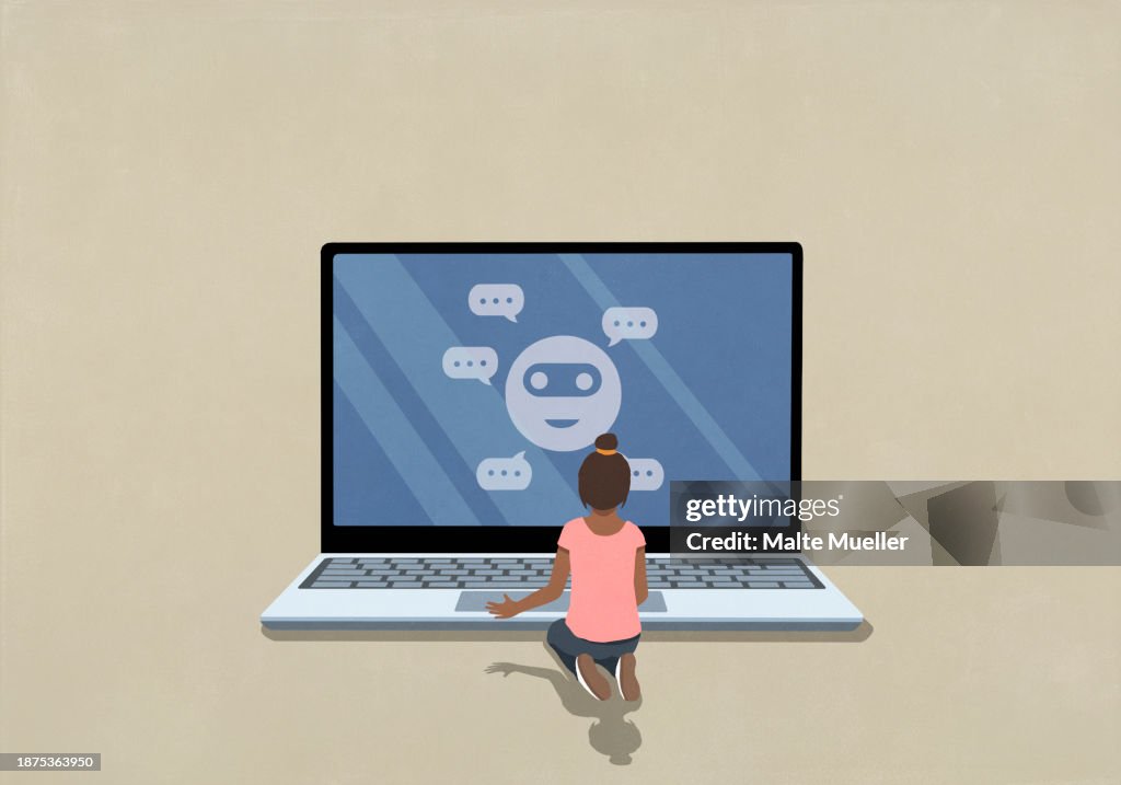 Girl video chatting at laptop screen