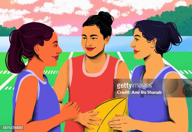 young female rugby players talking on rugby field - sportunterricht stock-grafiken, -clipart, -cartoons und -symbole