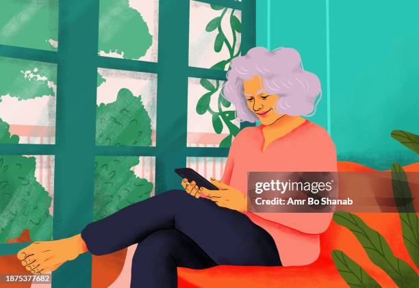 happy, serene senior woman using smart phone on sofa at home - retirement stock illustrations
