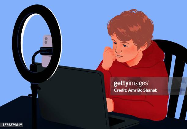 boy using laptop behind ring light and smart phone - live event stock illustrations