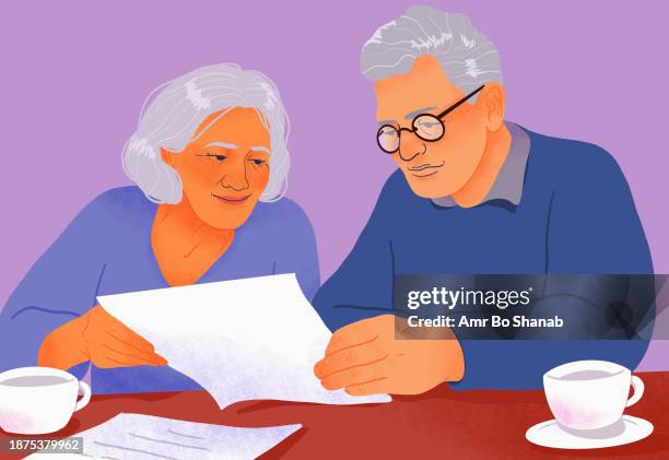 senior couple paying bills, discussing paperwork at table - senior adult stock illustrations