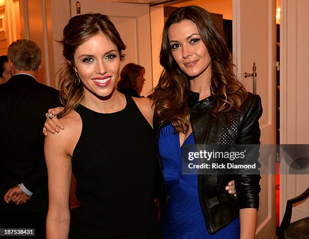 Actors Kayla Ewell and Olga Fonda attend The Vampire Diaries 100th Episode Celebration on November 9, 2013 in Atlanta, Georgia.