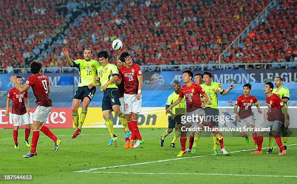 Kim Ju Yong of FC Seoul competes for the ball with Kim Yong Gwon of Guangzhou Evergrande during the AFC Champions League Final 2nd leg match between...