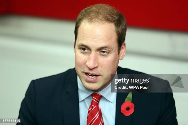 Prince William, Duke of Cambridge talks with injured WRU players in the Ray Gravell Room coach during the Autumn International between Wales and...