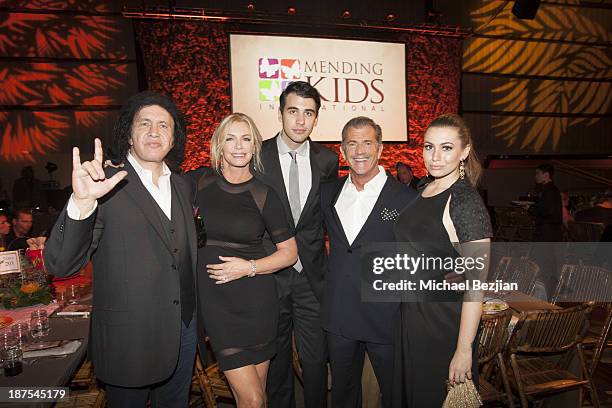 Gene Simmons, Shannon Tweed, Nick Simmons, Mel Gibson and Sophie Simmons attend Mending Kids International's Wings Around The World African Safari...