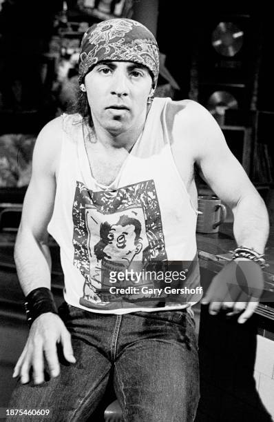 American Blues & Rock musician Steven Van Zandt sits on a barstool during an interview on MTV at Teletronic Studios, New York, New York, May 19, 1983.