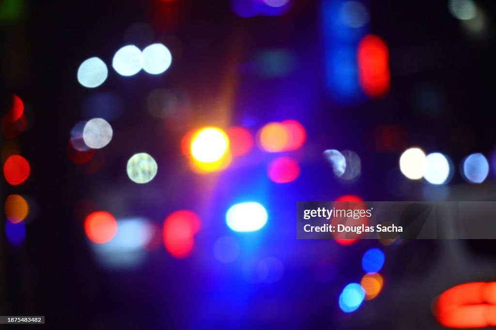 Police Car Lights, out of focus night time view
