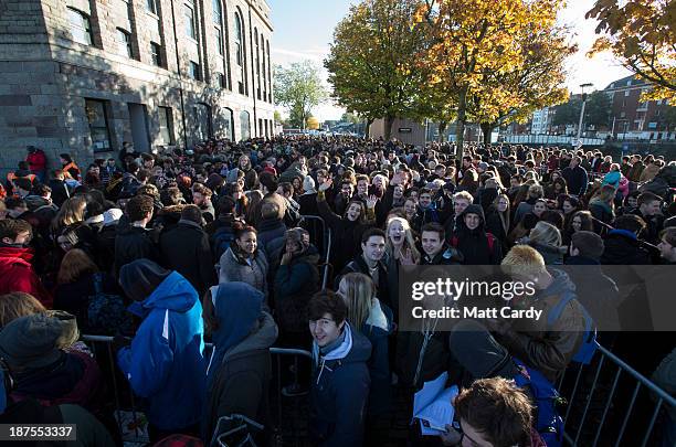 People queue outside the Bristol Arnolfini art centre for the second day of open auditions for two lead roles in the next Star Wars film on November...