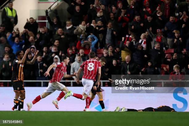 Jason Knight of Bristol City celebrates scoring their team's third goal during the Sky Bet Championship match between Bristol City and Hull City at...