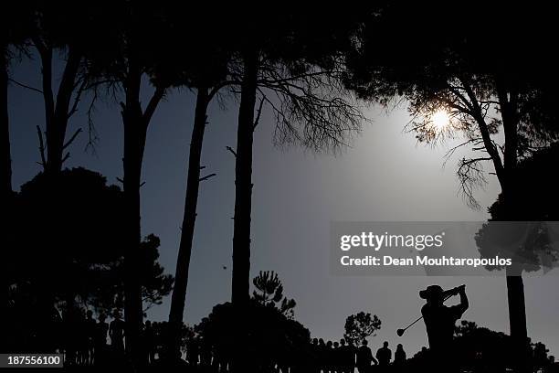 Raphael Jacquelin of France hits his second shot the 18th hole during the final round of the Turkish Airlines Open at The Montgomerie Maxx Royal...