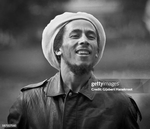 Jamaican reggae musician Bob Marley posed by the canal in Amsterdam, Netherlands in 1976.