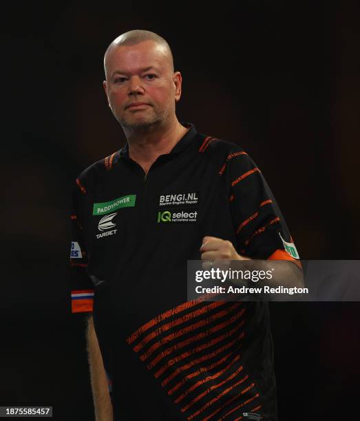 Raymond van Barneveld of The Netherlands celebrates during Day Eight of the 2023/24 Paddy Power World Darts Championship at Alexandra Palace on...