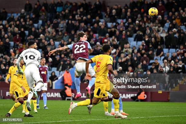Nicolo Zaniolo of Aston Villa scores their team's first goal during the Premier League match between Aston Villa and Sheffield United at Villa Park...
